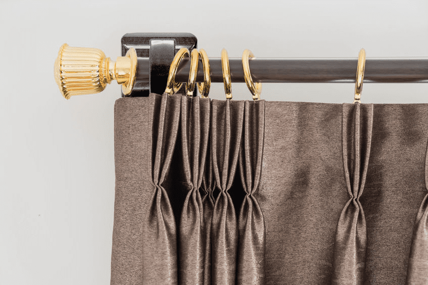 Black BuffBrac Curtain bracket with bronze curtain rod